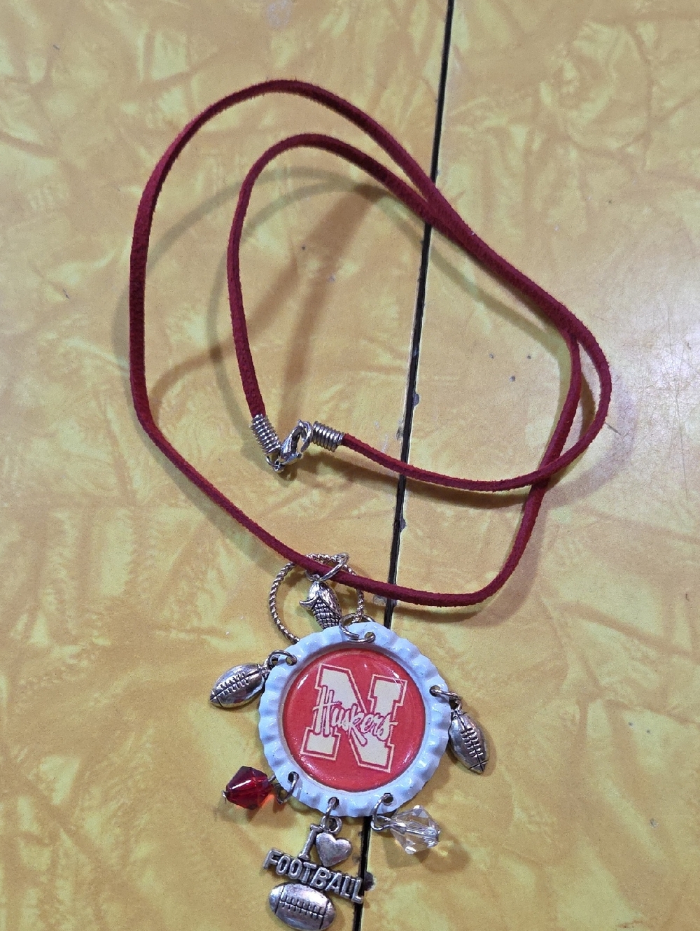 #G Nebraska Huskers Red Football Charm Necklace